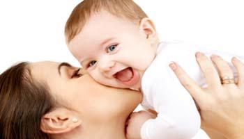 Mom Kissing Baby